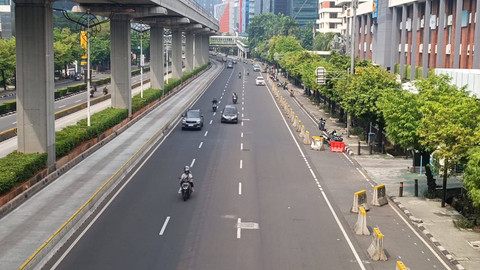 Kawasan Jalan Rasuna Said tampak lengang di long weekend Idul Adha, Sabtu (15/6). Foto: Fadlan Nuril Fahmi/kumparan