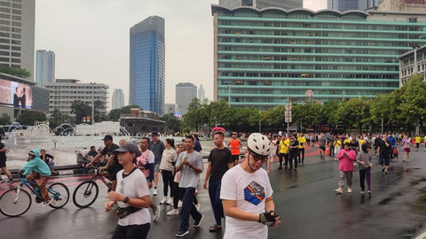 Suasana car free day (CFD) di Kawasan Bundaran HI, Jakarta Pusat, Minggu (16/6/2024). Foto: Rachmadi Rasyad/kumparan