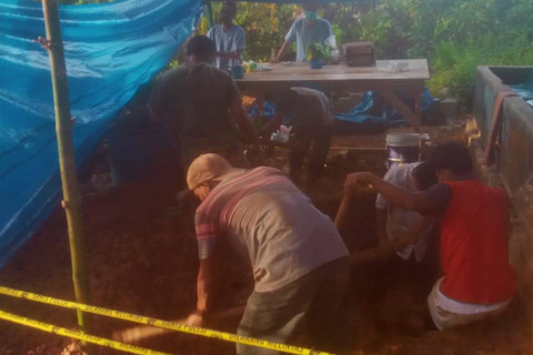 Proses ekshumasi pemakaman korban pengroyokan di wilayah Tapanuli Selatan. Foto: Dok. Istimewa