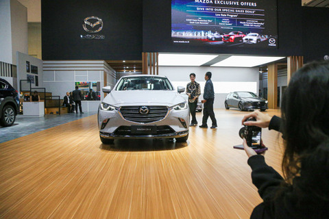 Mobil Mazda CX-3 di pameran otomotif Gaikindo Indonesia International Auto Show atau GIIAS 2024 di ICE BSD, Tangerang, Kamis (18/7). Foto: Aditia Noviansyah/kumparan