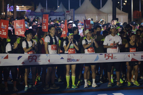 Peserta lomba lari Telkom Digiland Run 2024. Foto: Aditia Noviansyah/kumparan