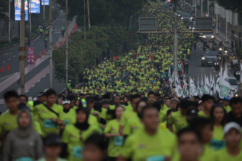 Peserta mengikuti lari pada acara Digiland Run 2024 di kawasan Gelora Bung Karno (GBK), Senayan, Jakarta, Minggu (28/7/2024). Foto: Aditia Noviansyah/kumparan