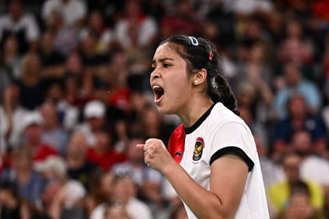 Tunggal putri Indonesia Gregoria Mariska Tunjung saat melawan tunggal putri Republik Ceko Tereza Svabikova pada babak penyisihan grup G Olimpiade Paris 2024 di Porte De La Chapella Arena, Paris, Prancis, Rabu (31/7/2024). Foto: Wahyu Putro A/ANTARA FOTO