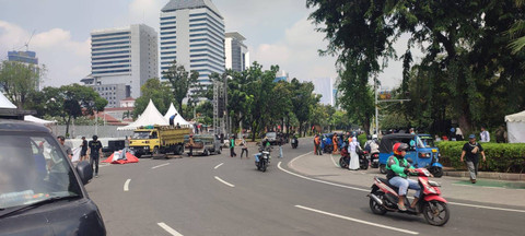 Suasana jalanan usai massa Aksi Solidaritas Internasional untuk Gaza membubarkan diri, pada Sabtu (3/8). Dok: Rachmadi/kumparan