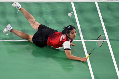 Tunggal putri Indonesia Gregoria Mariska Tunjung saat melawan tunggal putri Korea Selatan An- Se-young pada semifinal Olimpiade Paris 2024 di Porte De La Chapella Arena, Paris, Prancis, Minggu (4/8/2024). Foto: Arun SANKAR/AFP