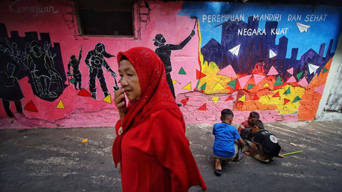 Warga dan Anak-anak Rusun Palembang di kampung sanitasi yang resmi di rilis hasil kerja sama dengan pemerintah Australia, Minggu (18/8) Foto: ary priyanto/urban id