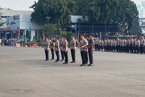 Prosesi serah terima jabatan pejabat inti Polda Metro Jaya pada Rabu (21/8/2024).  Foto: Abid Raihan/kumparan