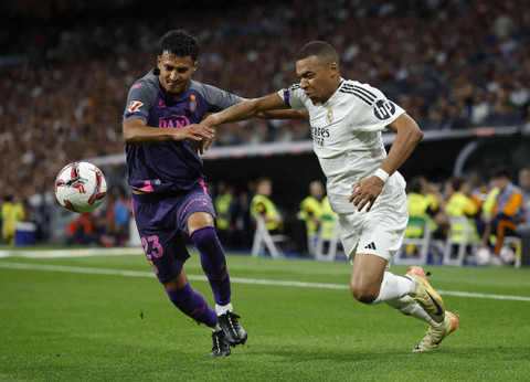 Real Madrid vs Espanyol dalam laga pekan keenam Liga Spanyol 2024/25 di Stadion Santiago Bernabeu, Minggu (22/9) dini hari WIB. Foto: Reuters / Juan Medina