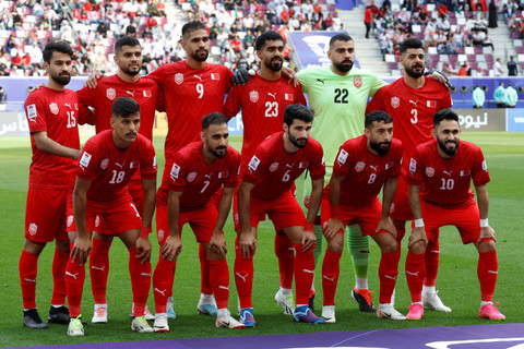 Pemain Timnas Bahrain saat pertandingan Grup E Piala Asia 2023. Foto: Karim Jaafar / AFP