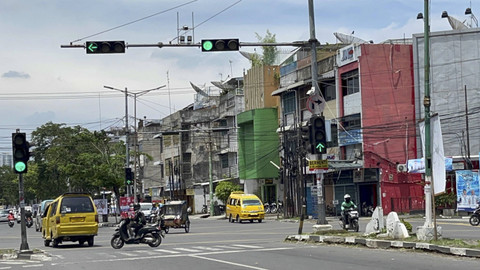Suasana jalanan di Medan. Foto: Tri Vosa/kumparan