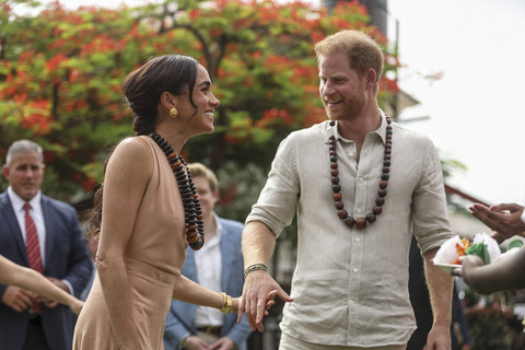 Pangeran Harry dan Meghan Markle. Foto: Kola Sulaimon/AFP