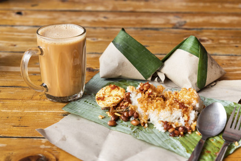 Ilustrasi budaya sarapan Malaysia mencangkup nasi lemak, roti canai hingga teh tarik. Foto: Hafizussalam bin Sulaiman/Shutterstock