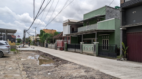 Penampakan Jl Hi Madang, Sukarame, Bandar Lampung usai di perbaiki. | Foto: Eva Nurdiah/Lampung Geh