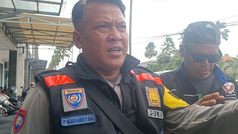 Bhabinkamtibmas Batununggal Polsek Bandung Kidul, Aiptu Dadan. Foto: Robby Bouceu/kumparan 