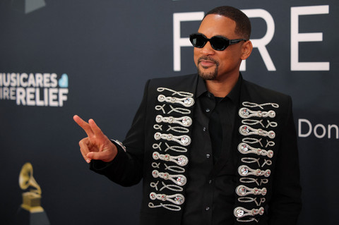 Will Smith tiba menghadiri Grammy Awards Tahunan ke-67 di Los Angeles, California, AS, Minggu (2/2/2025). Foto: Daniel Cole/REUTERS 