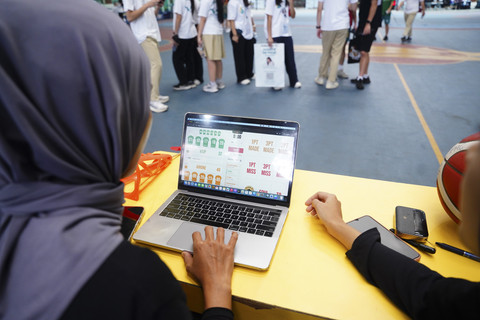 Tim Fotogrit saat membantu salah satu turnamen bola basket. Foto: Dok. Fotogrit