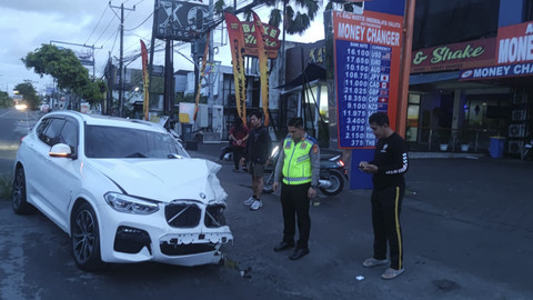 BMW bernomor polisi B 1 ULE, mobil yang dikemudikan WN Rusia berinisial AS. Foto: Dok. Polresta Denpasar