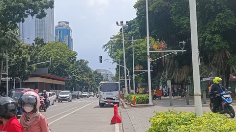 Situasi di kawasan Monas, Jakarta Pusat, Minggu (6/4). Foto: Zamachsyari/kumparan