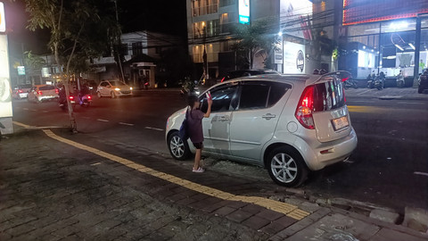 Anak bernama Ketut yang menjadi penjual tisu di Denpasar, Bali. Foto: Denita BR Matondang/kumparan
