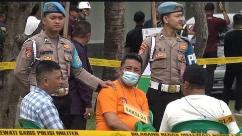 Aiptu K, anggota Polisi Polda Sumatera Selatan yang merupakan tersangka kasus perjudian. | Foto: Sinta Yuliana/Lampung Geh