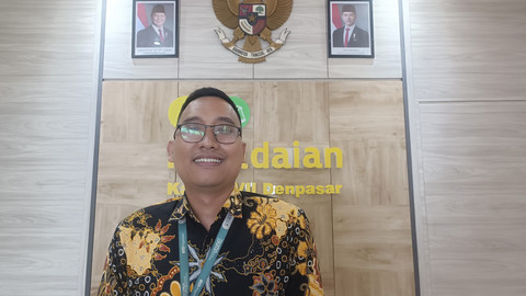 Kepala Bagian Analisa Bisnis dan Evaluasi Kinerja Pegadaian Wilayah VII Bali Nusra I Made Jaya Merta di kantornya, Senin (21/4/2025). Foto: Denita BR Matondang/kumparan