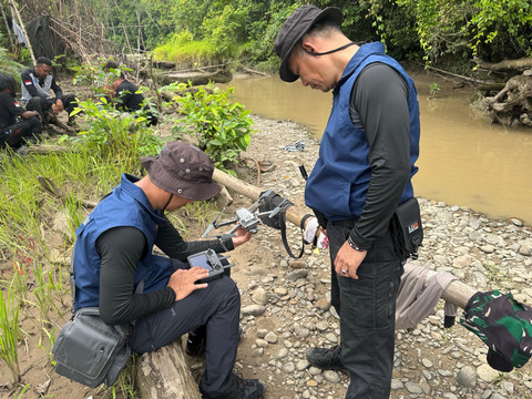 Polisi olah TKP di lokasi hilangnya Iptu Tomi.  Foto: Dok. Istimewa