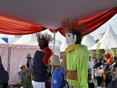 Suasana Lebaran Betawi di Monas, Jakarta Pusat, Minggu (27/4/2025). Foto: Rayyan Farhansyah/kumparan