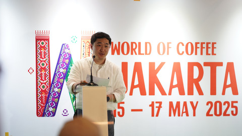 Kangmin Kim selaku pihak dari Pihak Exporum Korea, saat acara Konferensi Pers World of Coffee 2025. Foto: Dyandra