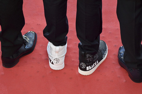 Sutradara AS Spike Lee pakai sneakers di Festival Film Cannes. Foto: Antonin Thuillier/AFP
