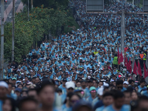 Puluhan ribu pelari meramaikan Digiland Run 2025 di Istora Senayan, Jakarta pada Minggu (18/5). Foto: Dok. Telkom