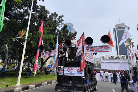 Aksi buruh dari Konfederasi Serikat Pekerja Nusantara (KSPN) di Kawasan Patung Kuda, Jakarta, Minggu (1/6/2025). Foto: Luthfi Humam/kumparan
