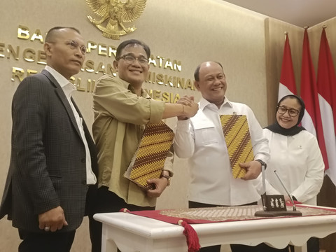 Penandatanganan kerja sama BP Taskin dengan Badan Gizi Nasional di kantor BP Taskin, Jakarta, Senin (16/6/2025). Foto: Muhammad Fhandra Hardiyon/kumparan