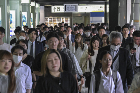 Ilustrasi pekerja di Jepang. Foto: Richard A. Brooks/AFP