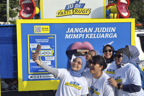 Kampanye Judi Pasti Rugi saat CFD di Jakarta, Minggu (6/7/2025).  Foto: Argya D. Maheswara/kumparan 