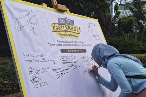 Kampanye Judi Pasti Rugi saat CFD di Jakarta, Minggu (6/7/2025).  Foto: Argya D. Maheswara/kumparan 