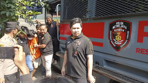 Polda Metro Jaya dan Polres Tangerang Selatan menggelar rekontruksi pembunuhan wanita terborgol, Selasa (22/7/2025). Foto: kumparan