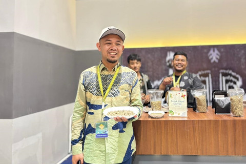 Pemilik Teluk Gayo Coffee Iqbal Aisar dalam acara Karya Kreatif Indonesia, Kamis (7/8/2025). Foto: Ave Airiza Gunanto/kumparan