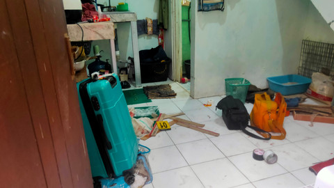 Rumah pelaku yang dijadikan tempat memutulasi wanita Mojokerto di kawasan Lidah Wetan, Surabaya. Foto: Mili.id