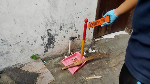 Rumah pelaku yang dijadikan tempat memutulasi wanita Mojokerto di kawasan Lidah Wetan, Surabaya. Foto: Mili.id