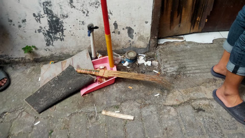 Rumah pelaku yang dijadikan tempat memutulasi wanita Mojokerto di kawasan Lidah Wetan, Surabaya. Foto: Mili.id