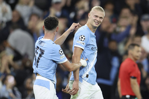 Pemain Manchester City Erling Haaland berselebrasi usai mencetak gol ke gawang Napoli pada pertandigan di Stadion Etihad, Manchester, Inggris, Kamis (18/9/2025). Foto: DARREN STAPLES/AFP