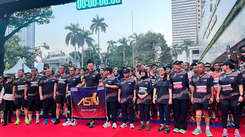 Suasana ASN Run 2025 di Kantor Kemendikdasmen, Senayan, Jakarta Pusat, Minggu (21/9).  Foto: Nasywa Athifah/kumparan