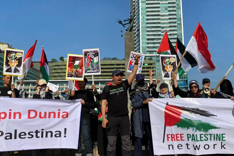 Sekjen Free Palestine Network (FPN) Furqan AMC saat aksi bela Palestina di CFD Bundaran HI, Jakarta Pusat, Minggu (21/9/2025). Foto: Nasywa Athifah/kumparan