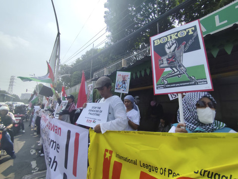 Aksi bela Palestina di kawasan Tugu Tani, Jakarta Pusat, pada Minggu (5/10/2025). Foto: Rachmadi Rasyad/kumparan