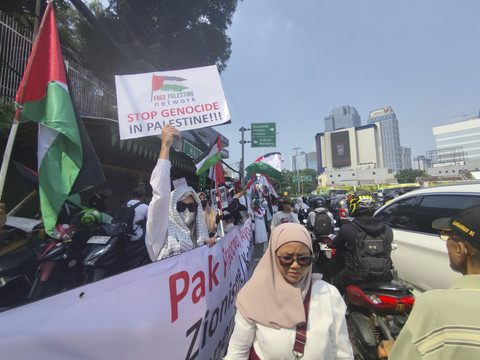 Aksi bela Palestina di kawasan Tugu Tani, Jakarta Pusat, pada Minggu (5/10/2025). Foto: Rachmadi Rasyad/kumparan