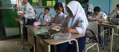 Penerimaan Makan Bergizi Gratis (MBG) di SMP Negeri 13 Surabaya. Foto: Farusma Okta Verdian/kumparan