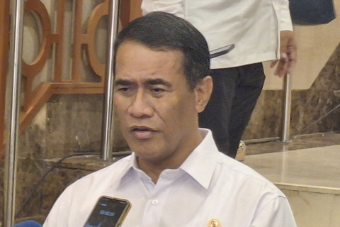 Menteri Pertanian Andi Amran Sulaiman usai acara Town Hall 1 Tahun Kinerja Kemenko Pangan di Grha Mandiri, Jakarta Pusat, Selasa (21/10/2025). Foto: Argya D. Maheswara/kumparan 