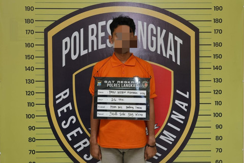 Tersangka berinisial PHAH (26) diamankan Polres Langkat atas kasus pemerasan terhadap wanita di Langkat, Sabtu (1/11/2025). Foto: Polres Langkat