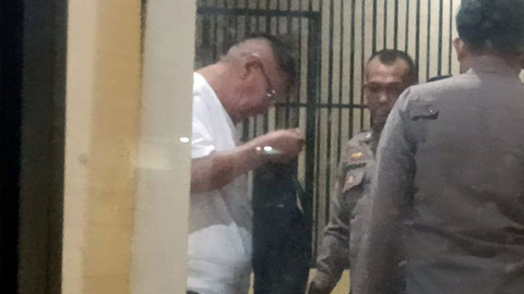 Anggota DPRD Kabupaten Kepulauan Sangihe, FJS alias John, saat berada di Polda Sulawesi Utara.