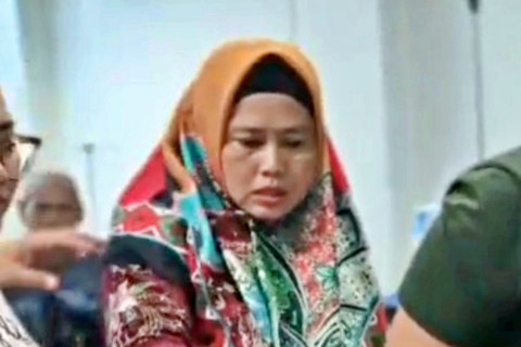 Teni Ridha Shi, ibu tiri Nizam Syafei (13), kini menjadi tersangka penganiayaan hingga tewas. Foto: Dok. Istimewa
